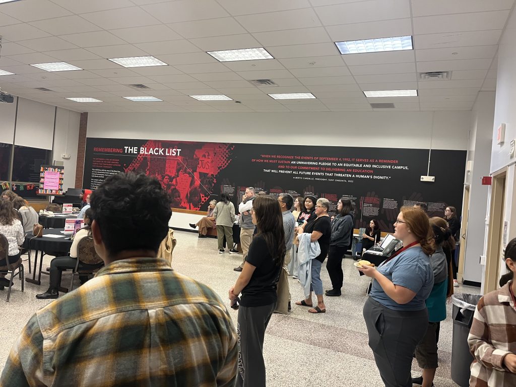 A crowd of students, faculty, staff and community members gathered for Oneonta’s contribution to the nationwide Banned Books Week celebration. (Photo provided)