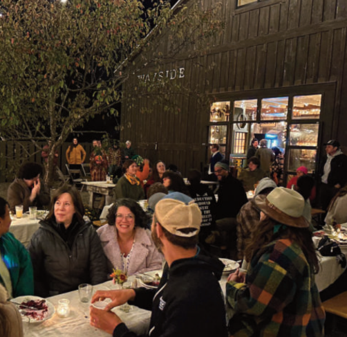 A group sitting at a table.