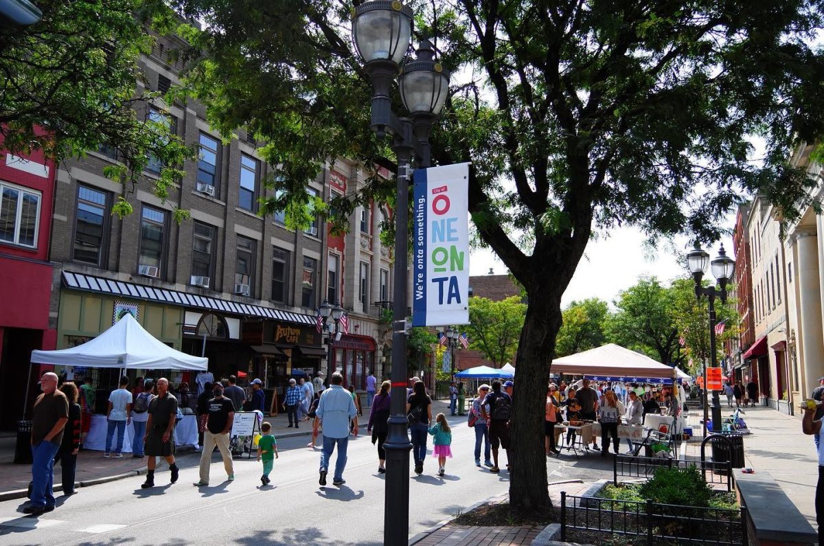 Main Street Oneonta, with many people attending the City of the Hills Festival.